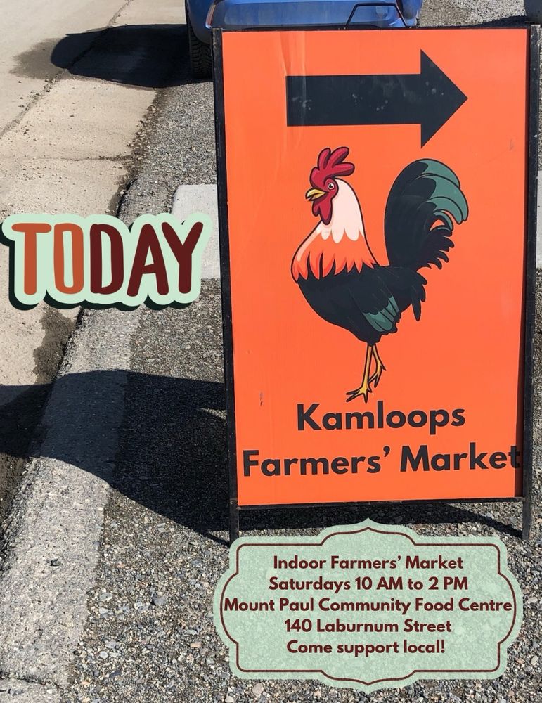 A background photo shows a bright orange way finding sign with a large arrow pointing to the right above the colourful KFMmrooster logo. The image has text which says, “Today,” and text in a banner which says, “Indoor Winter Market, Saturdays, 10 AM to 2 PM, Mount Paul Community Food Centre, 140 Laburnum Street, Come support local!” 