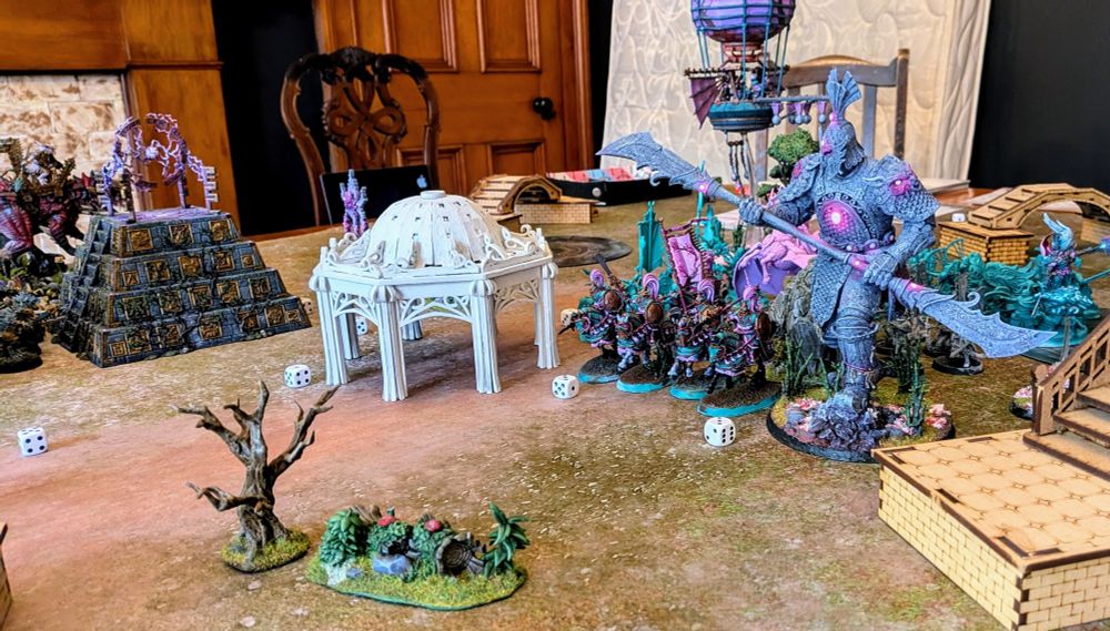 Picture of our armies on the tabletop. Mine are only half painted but those who are stand proud. A massive Cathayan Sentinel stands in the foreground.