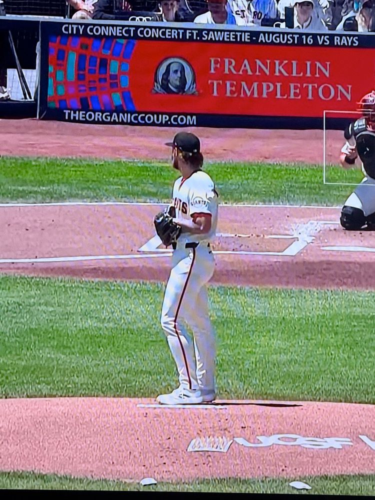 MLB pitcher Carson Whisenhunt standing on the mound. SF Giants uniform. 