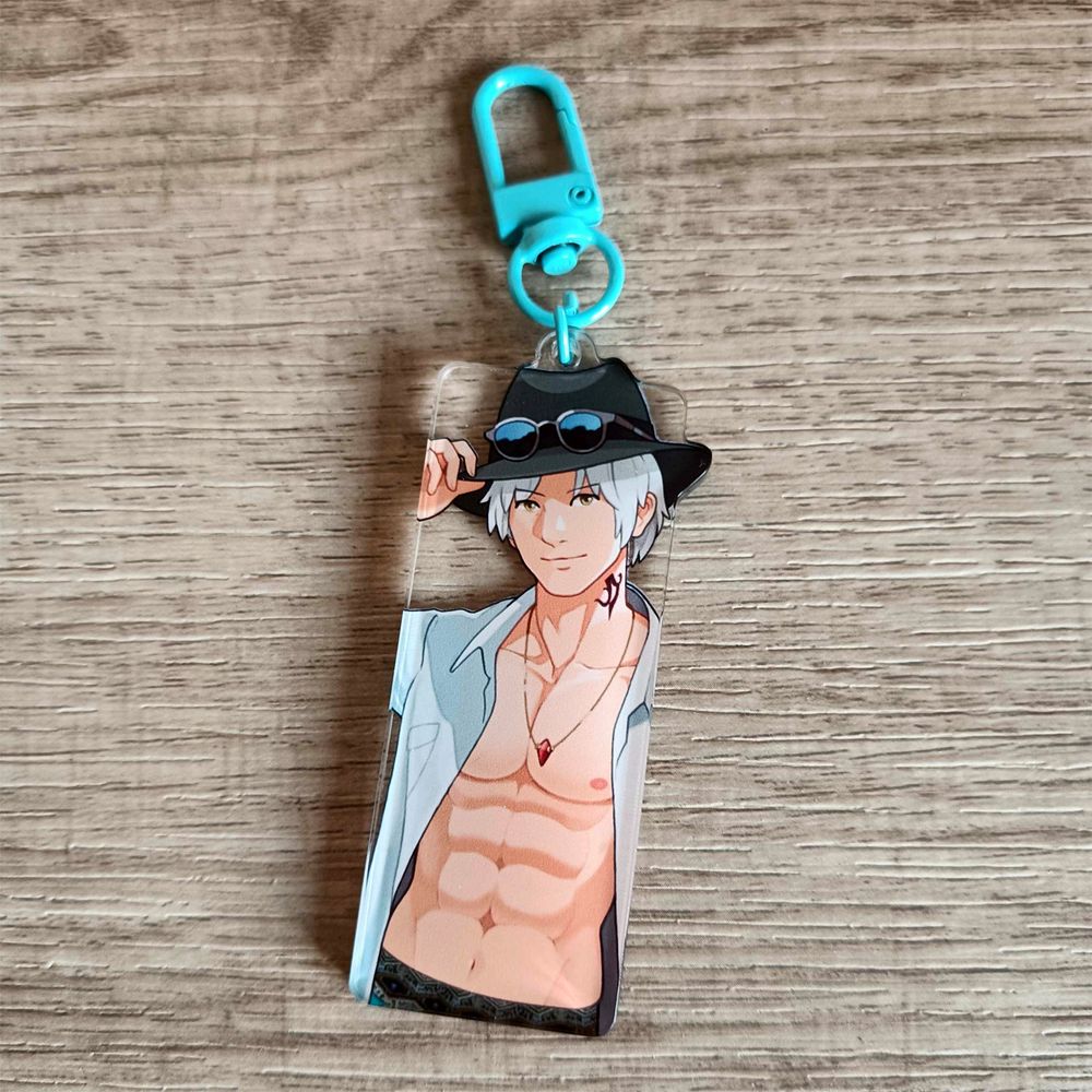 An acrylic charm featuring Thancred Waters in a summer beach outfit.