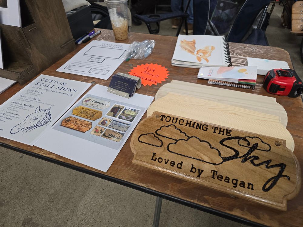 Booth display highlighting custom stall sign examples