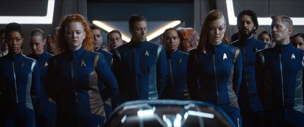 The crew of Discovery attending Airiam’s funeral in a screenshot from The Red Angel.