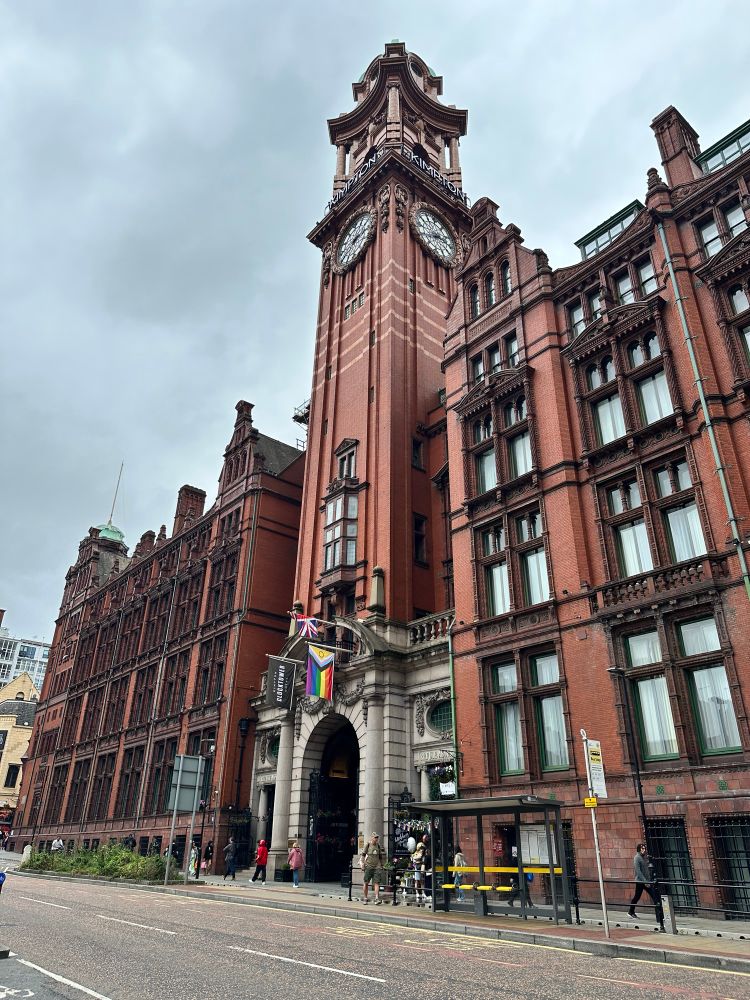 External shot of ted brick Victorian building. 