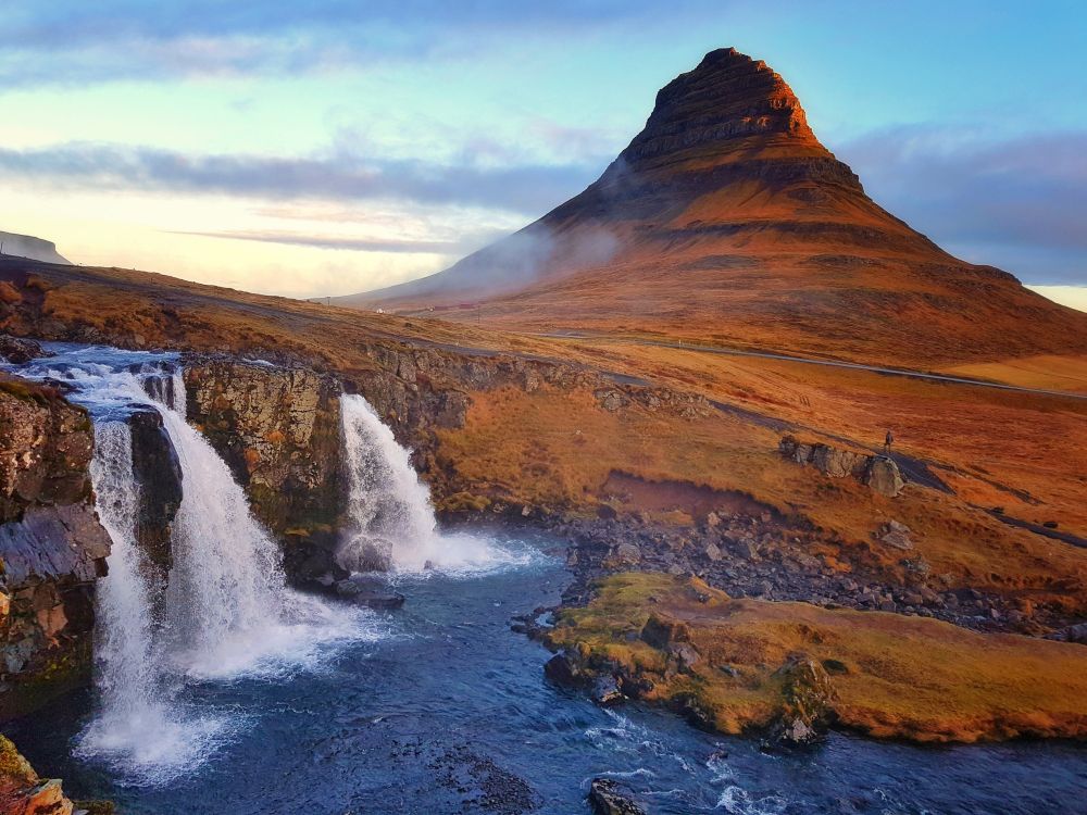 Kirkjufellsfoss waterfall is on the northern side of the Snæfellsnes Peninsula in West Iceland. It's also a part time actor, Kirkjufell (