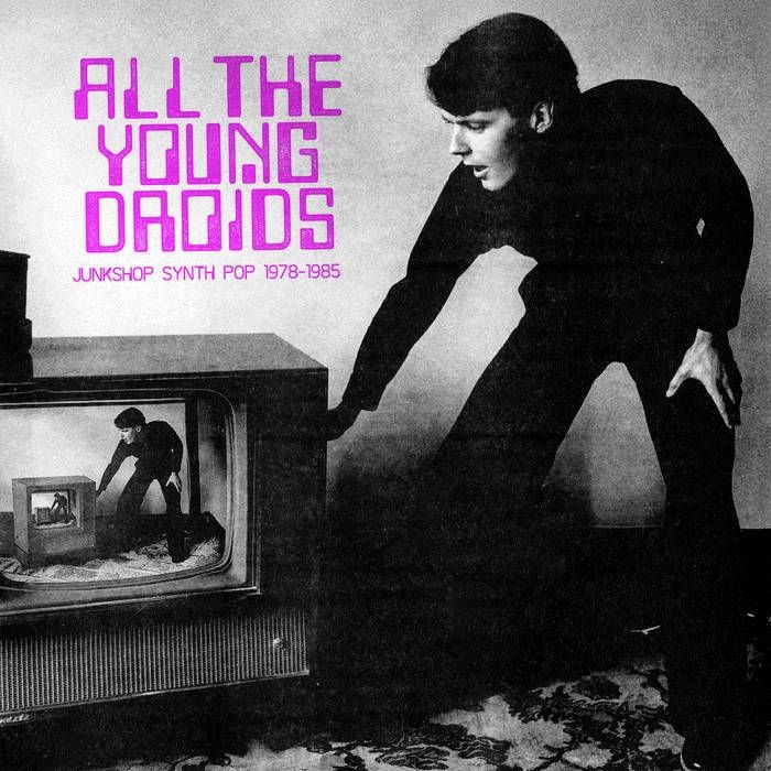 the cover of all the young droids: junkshop synth pop 1968-1985, an image of a new wave looking cat in a tromp l'oeil where he's seeing himself looking into the TV diminishing into infinity 