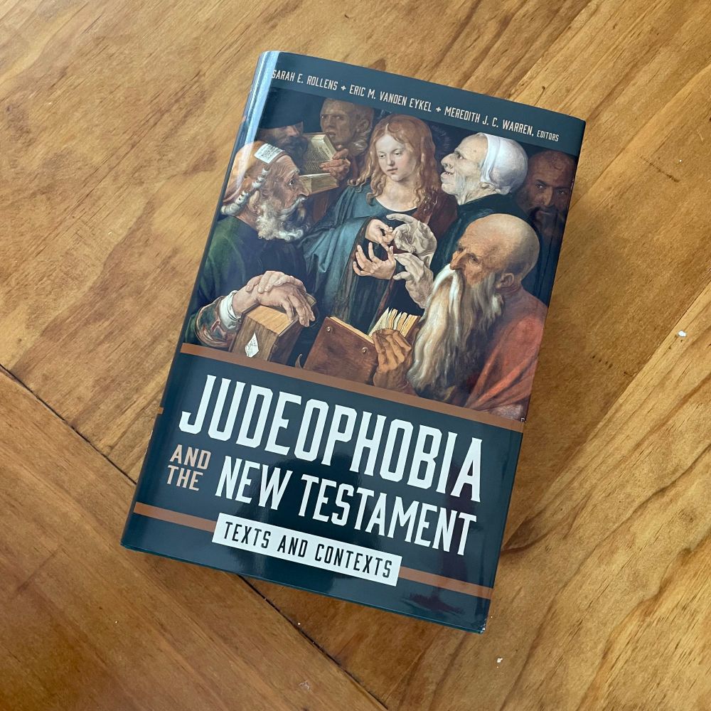 A copy of “Judeophobia and the New Testament” on a wooden table.