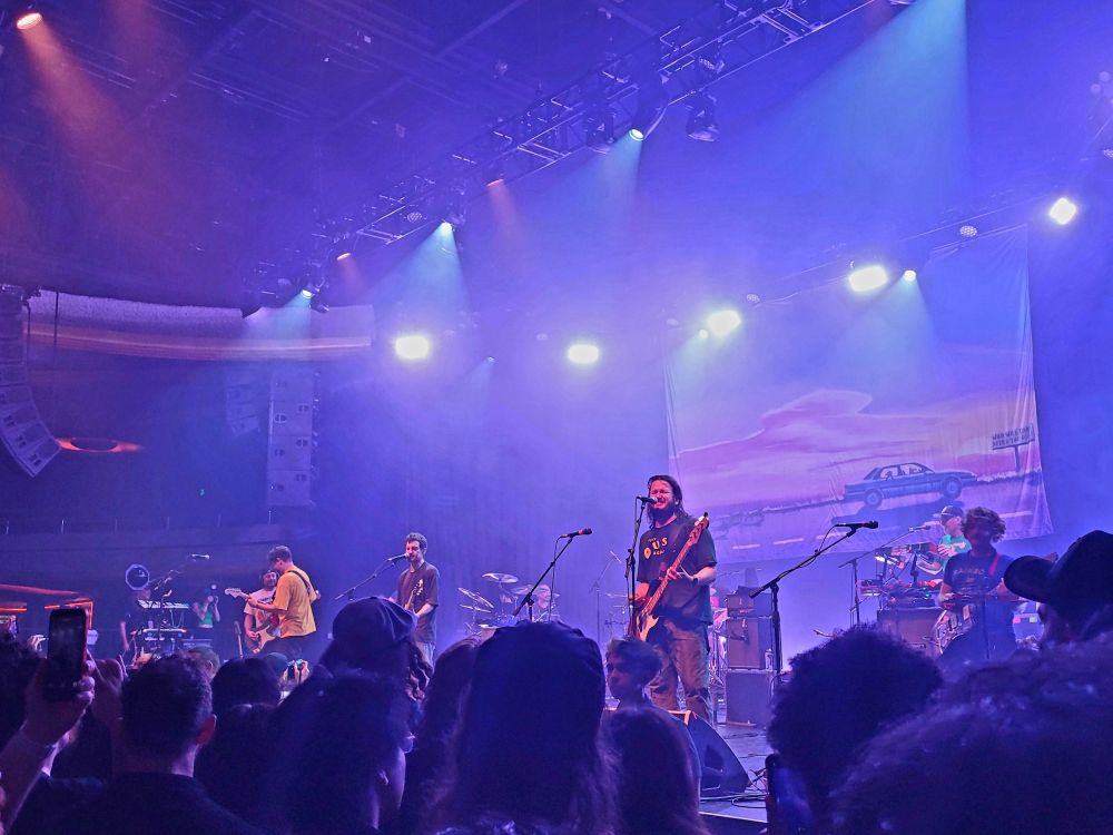 A photo of the band PUP on stage. 