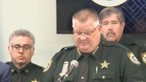 Deputies Dawg, Dozy and Dopey of a Florida law enforcement operation at a press conference
