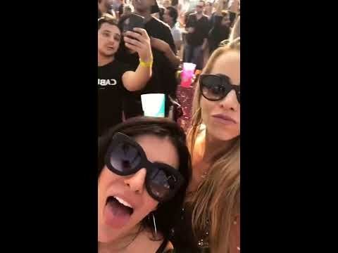 girl get drugged at a festival while song "Cola" is playing