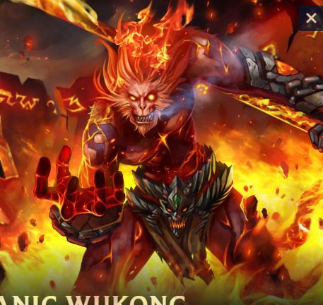 Splash art from League of Legends of Volcanic Wukong. He's a monkey man who is sort of red and on fire. 