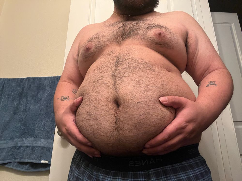 Frontal view; hairy chub belly with visble chest