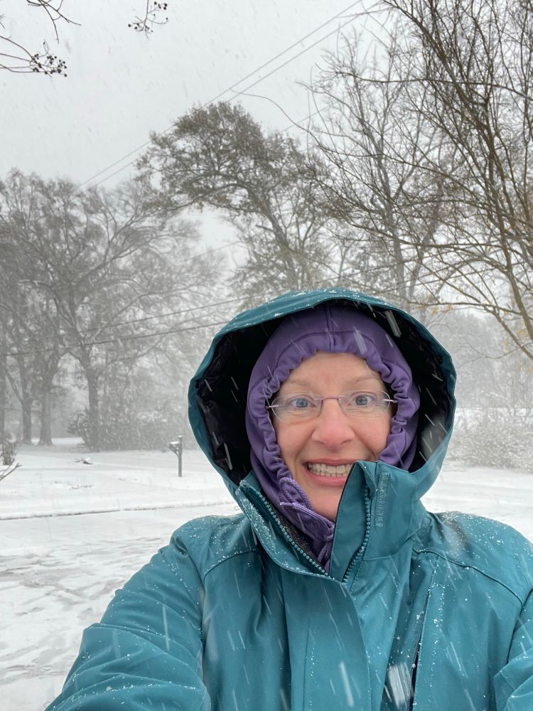 Emily in the snow freezing as only a Louisiana native can do. 