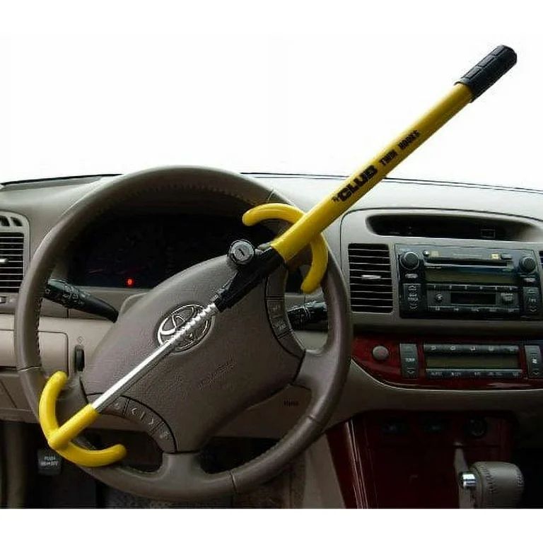 a yellow lock mechanism that looks like a stick on a steering wheel