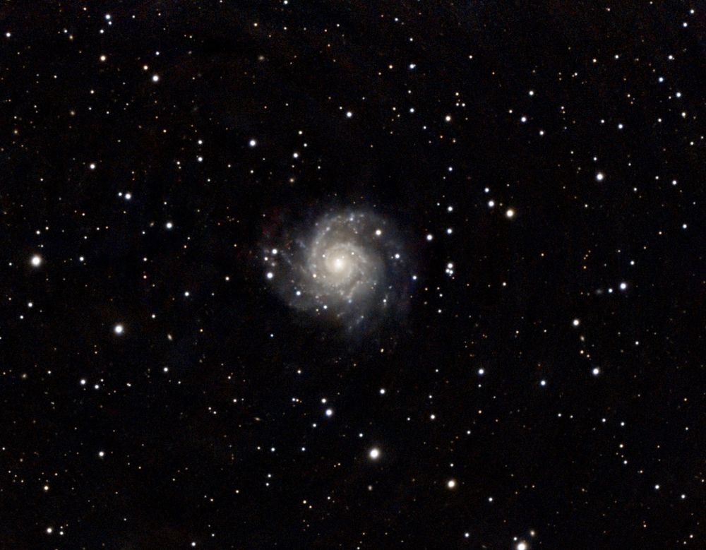 Spiral galaxy in a field of stars.