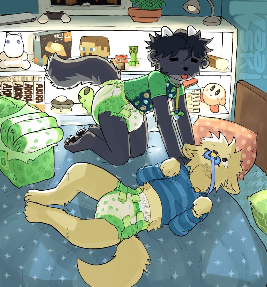 Wovie and a crème colored dog playing in diapers and childish clothes.