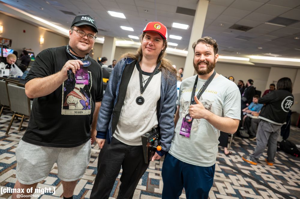 Its a picture taken at Climax of Night Final Season: [breakadawn] event on 10/25/25 by goonpnw.bsky.social from the Hilton Atlanta Northeast hotel in Norcross, Georgia.

Its the Top 3 players of Sailor Moon S at Climax of Night