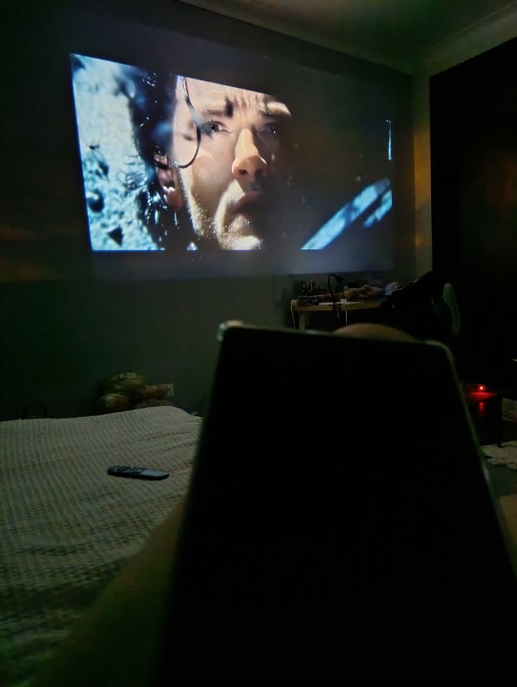 Me laying on the couch with my tablet to read a hobbit barduil fanfic while watching dracula untold projected on my walls 