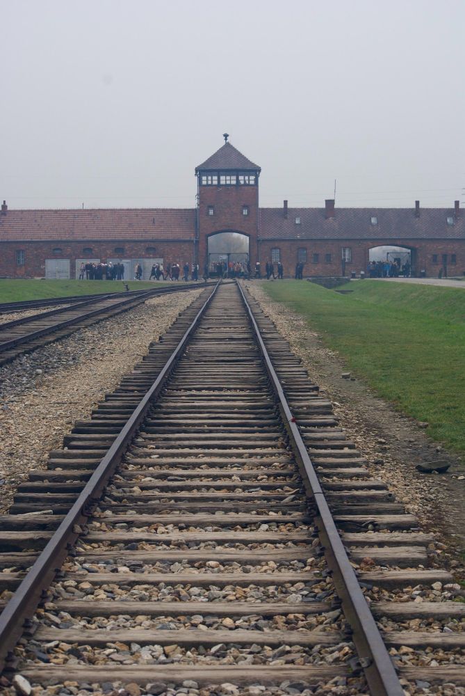 Train tracks leading into the entrance of Auschwitz Birkenau concentration camp