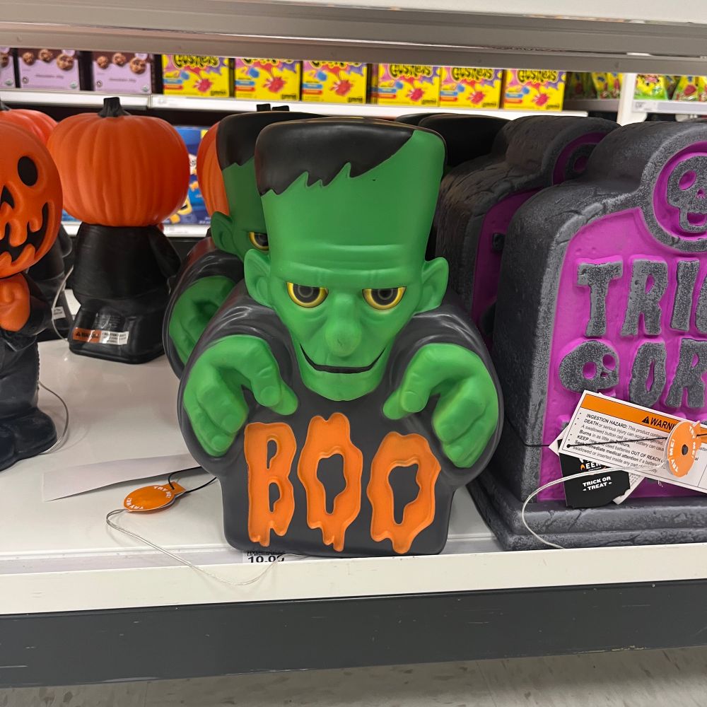 blow mold of frankenstein with the word boo under him 