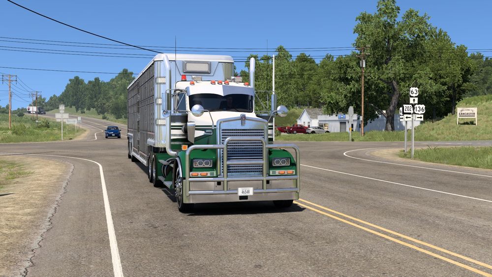 American Truck Simulator screenshot of my Kenworth W900 passing through Lancaster on Route 63 - Blink and you missed it 😅