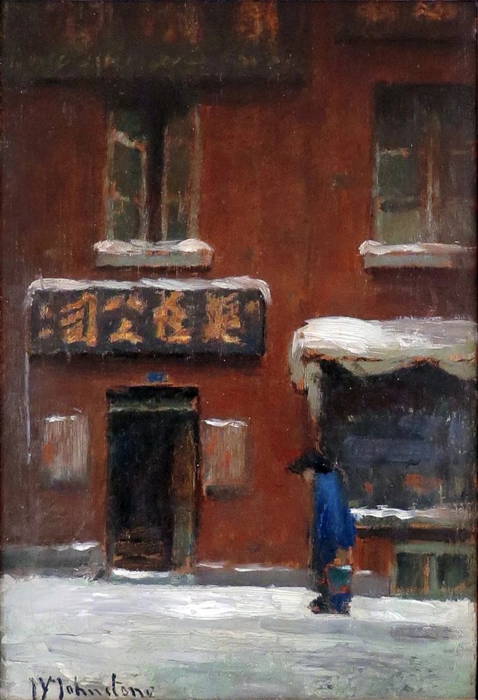 Oil sketch by John Young Johnstone, titled The Chinese Shop c. 1920. A figure in blue (carrying what looks like a bucket) stands in front of a rust coloured building in Montreal's Chinatown. White streaks of snow highlight the ground, the signage, and the windows above. The composition is tightly framed on the figure and building and the paint is loosely applied, with simple strokes delineating the scene.