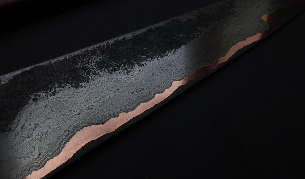 Closeup of the gyuto.
Showcasing the intricate details of the wrought layers