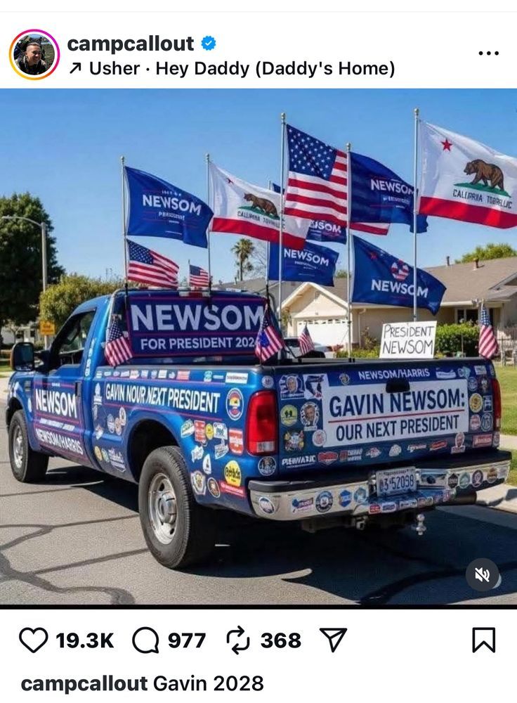 A truck decked out in Gavin Newsome flags and bumper stickers mimicking Trump voters.