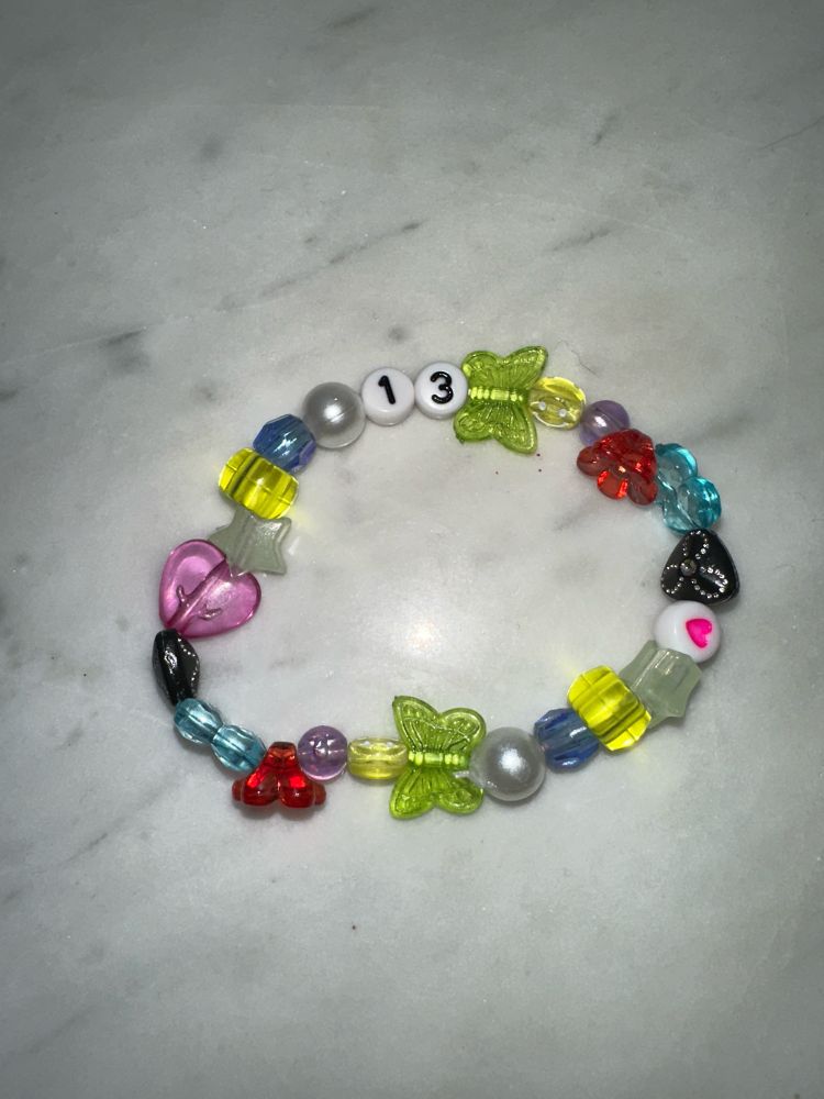 a colorful bracelet with the number 13 