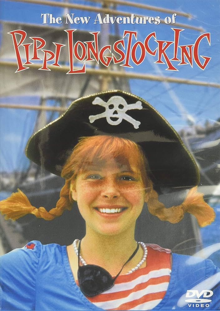 A movie poster for the movie, the new adventures of Pippi Longstocking, featuring a youngish girl on the cover with pigtails pulled so that they are sticking out from her head on either side. She wears a pirate hat and a red and white striped shirt under a blue dress behind her is a ship of olden times with sales.