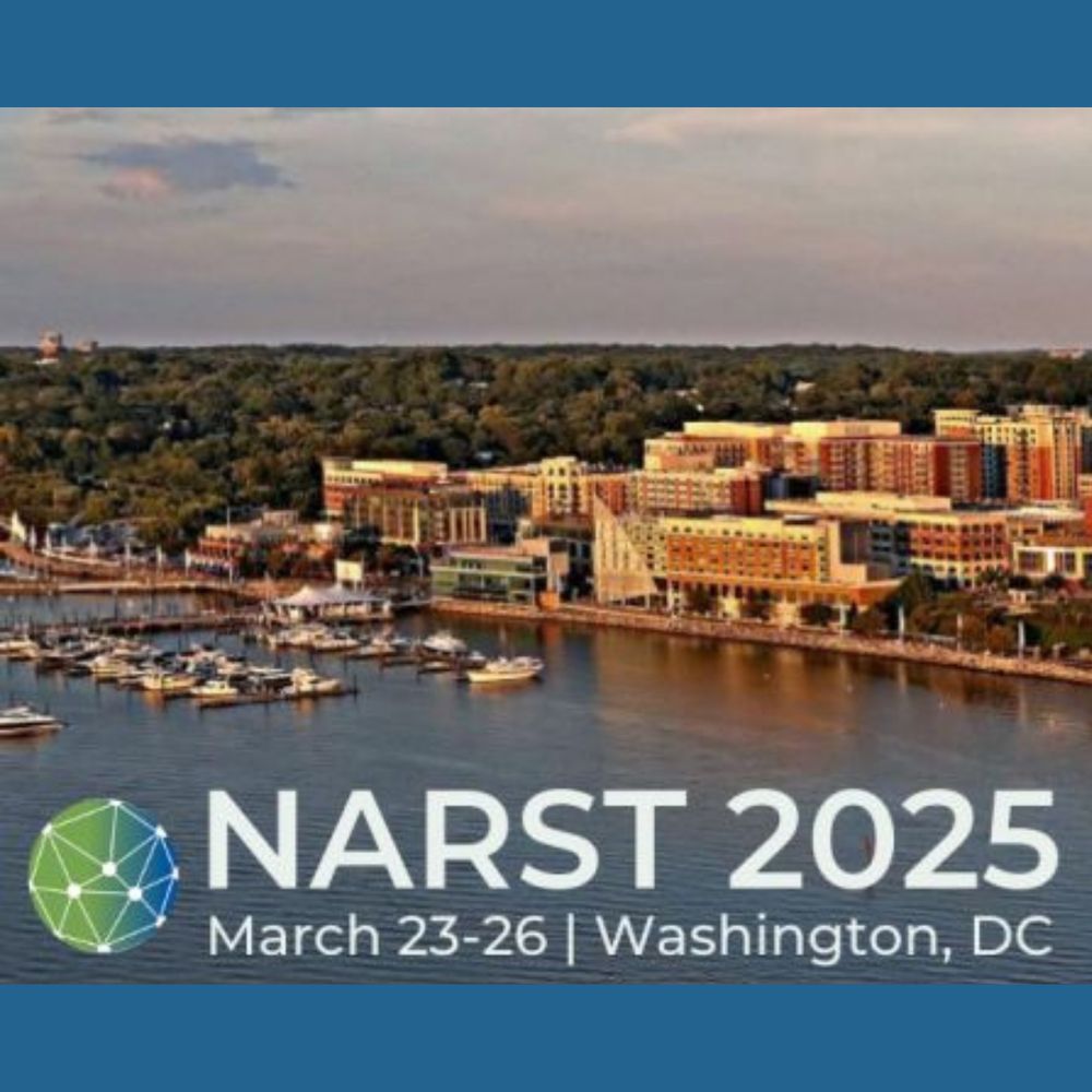 NARST 2025 March 23-26 Washington, DC. Image of National Harbor, Maryland. Buildings along harbor with boats floating in the water.