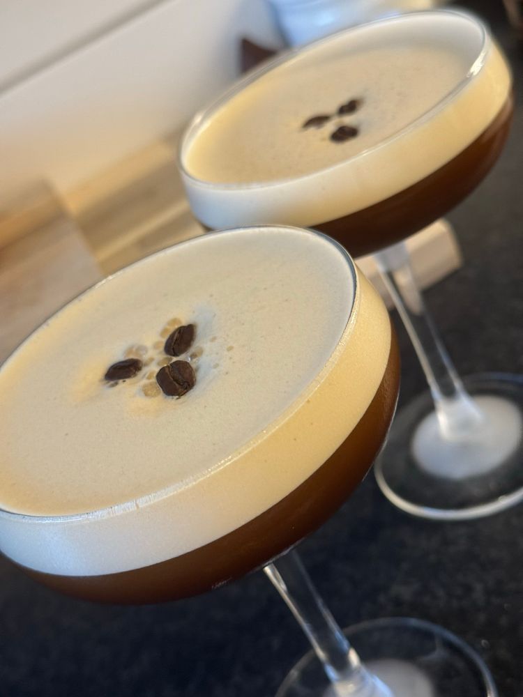 2 very well shakes espresso martinis in coupe glasses 