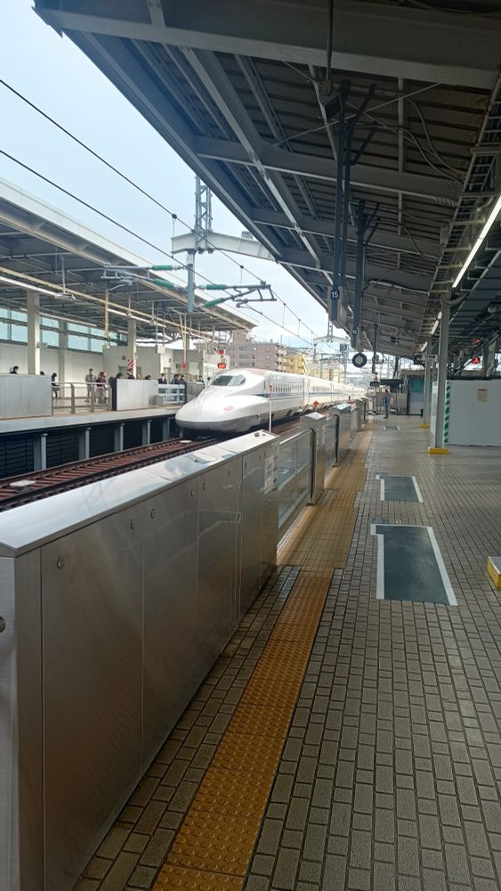 A Shinkansen train leaving Shin-Osaka station