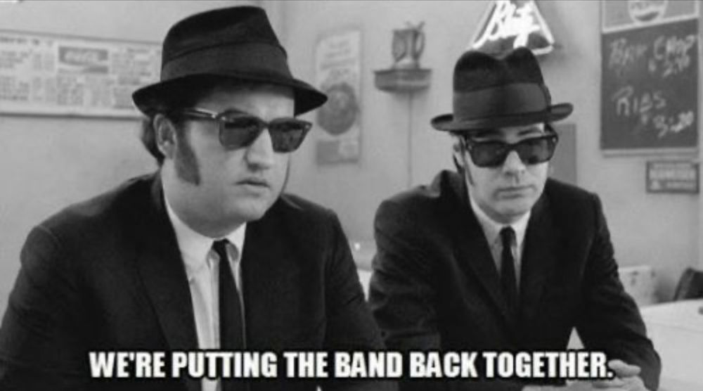 Screen capture from the blues Brothers movie saying we're putting the band back together