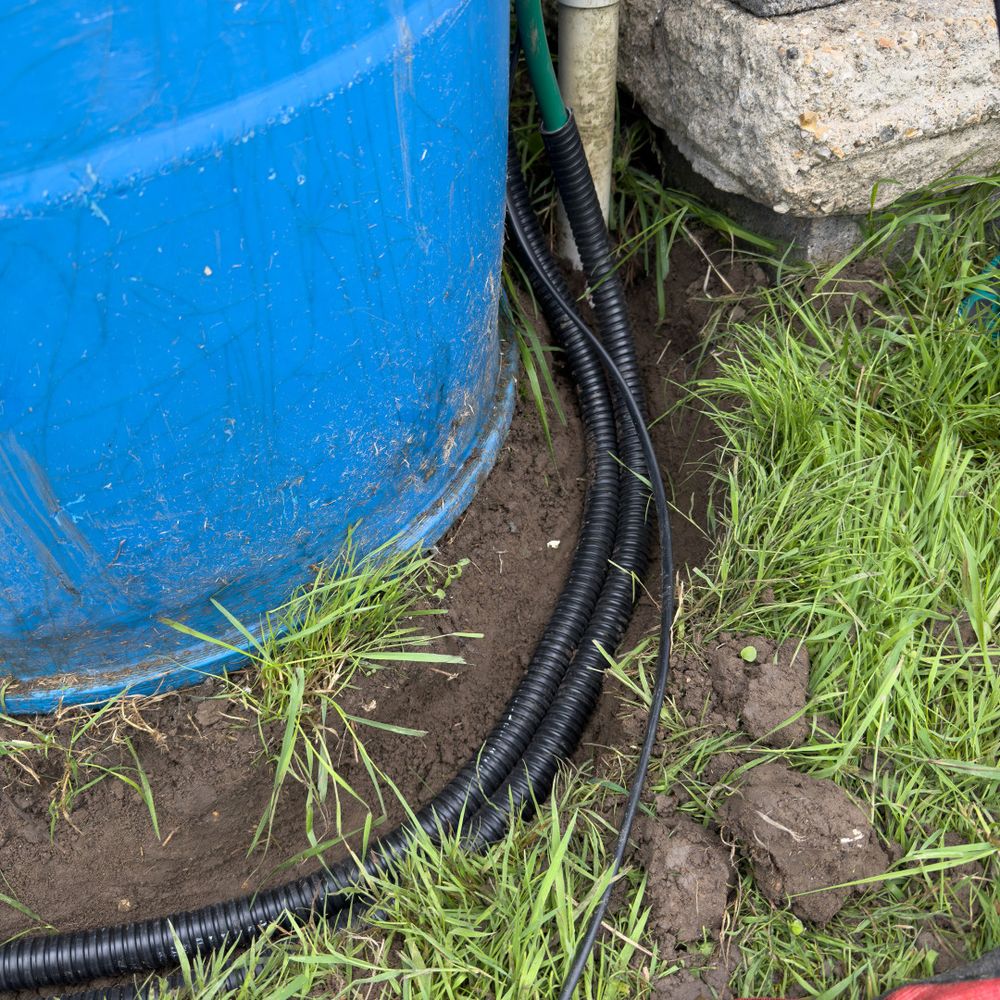 Water tank with sensor cables and pipes