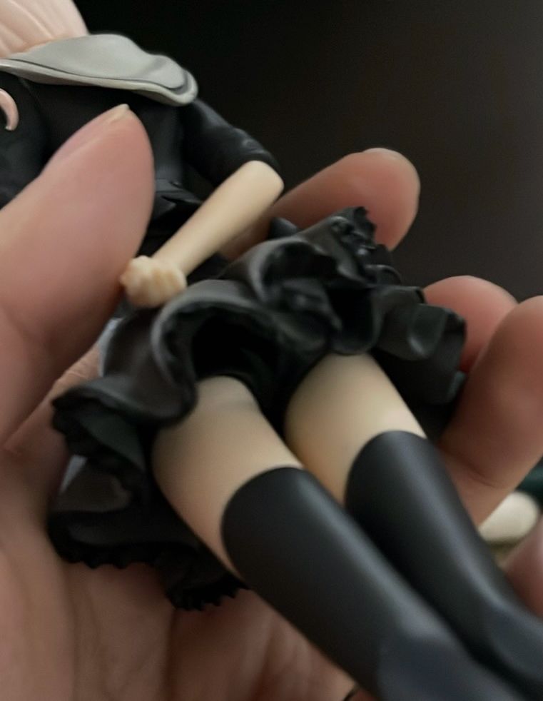 the underside of a desktop decorate mizuki figure