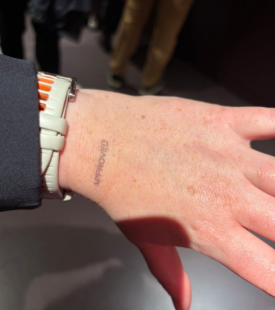 A hand stamped ‘approved’ 