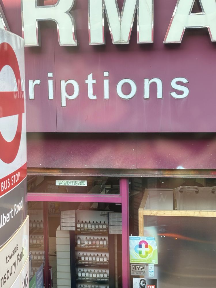 Pretty dirty shopfront of a pharmacy 
