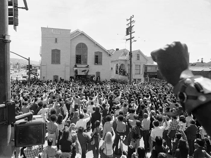protestors and mourners convening at the funeral of murdered Black prisoner, George Jackson