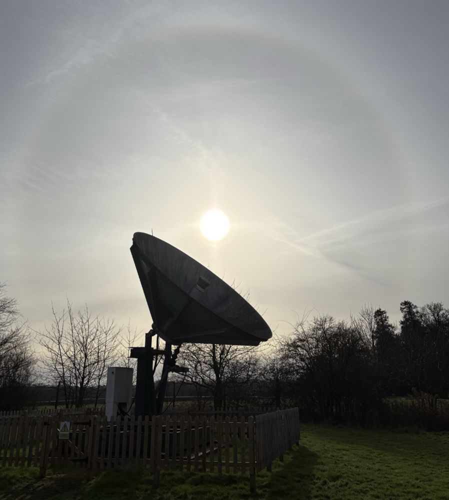 Another view of the sun halo, this time with a radio telescope in the foreground.