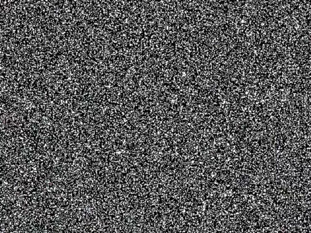 it looks like a black and white background with a lot of small dots on it .