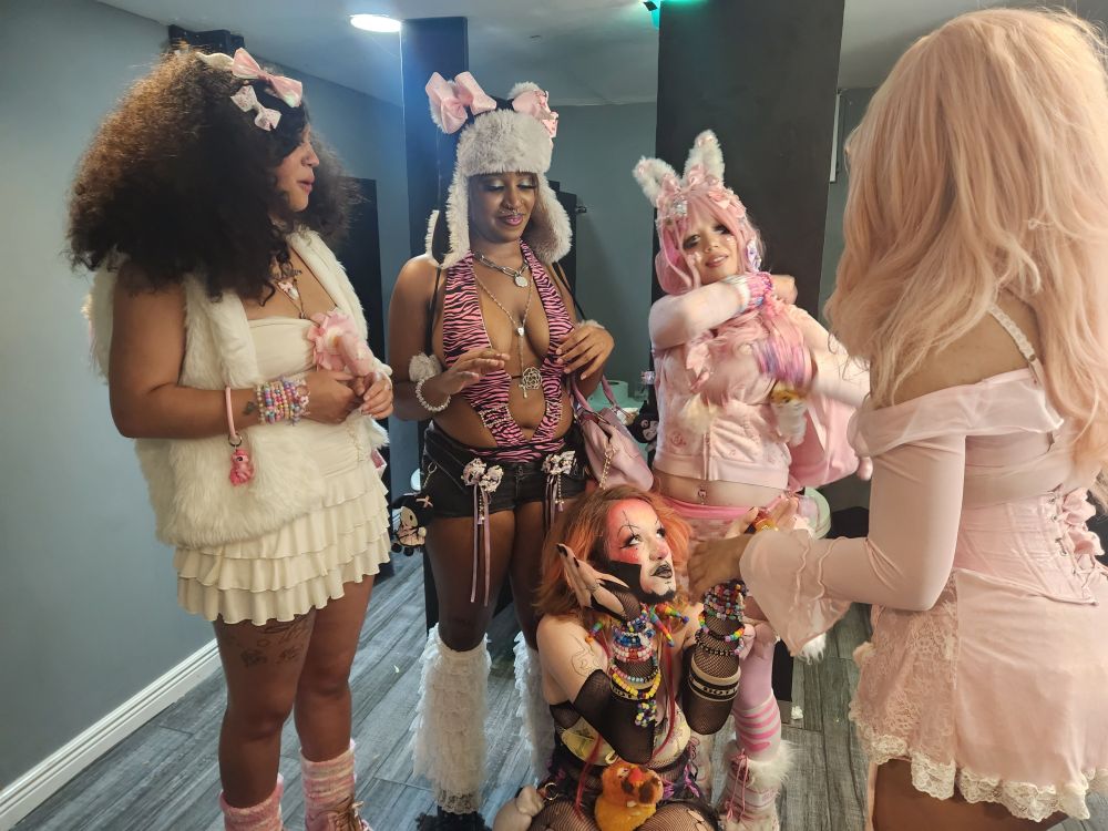 a group of well dressed people in the bathroom 