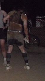 photo of my wife from the back after  a baseball game. she is covered in dirt