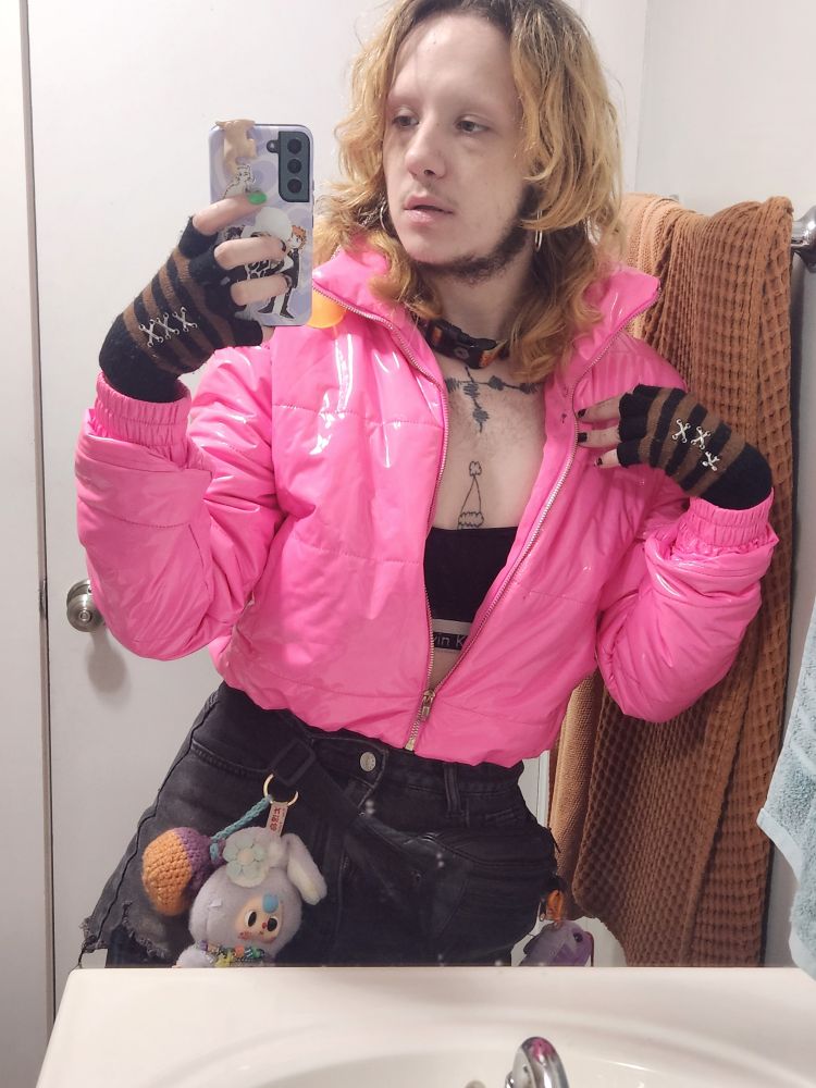 selfie of me in a pink puffy jacket