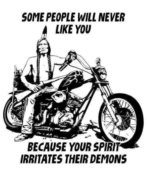 Black and white drawing of an American Indian holding a long gun on a chopper captioned "SOME PEOPLE WILL NEVER LIKE YOU BECAUSE YOUR SPIRIT IRRITATES THEIR DEMONS" 