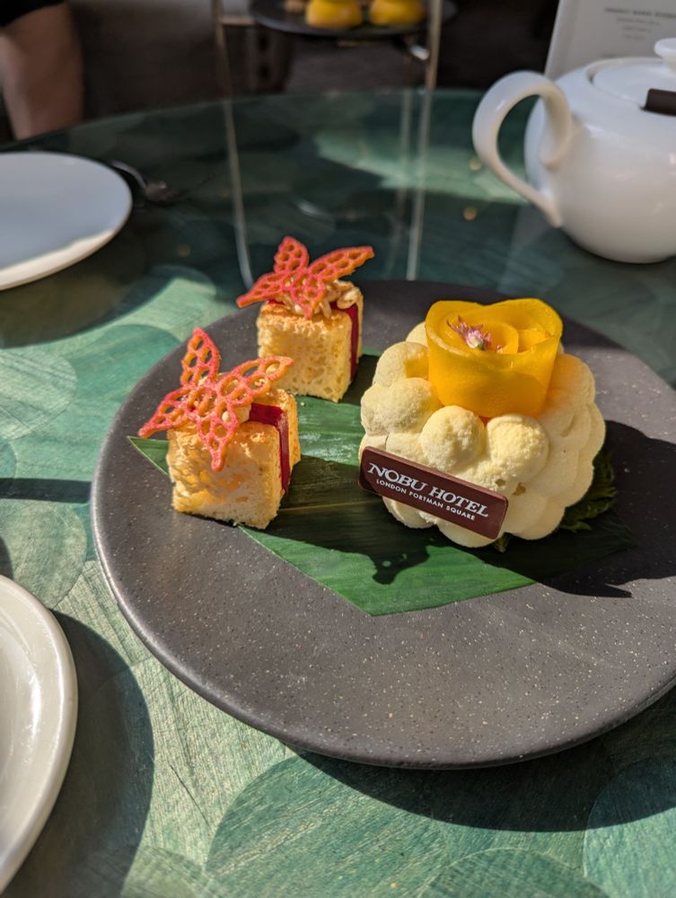 Vanilla chiffon cake with guava cream, puffed rice and a crispy little pink butterfly cookie on top. The Mango Cheesecake, the flagship of the course, in a form I've never seen before, like a bubbly little nimbus cloud crowned with a mango florette and a single edible flower. The cloud is filled with chunks of lusciously soft, perfectly ripe mango and the whole thing sits on a secret shiso leaf (aka perilla, I was mistaken in my previous caption mentioning mitsuba, which is a completely different plant, oops, fuck, yes I am still jet lagged, why do you ask) that completes the flavour profile. Even the little chocolate name plate on the cheesecake was delicious, a luscious dark chocolate that melts in your mouth.