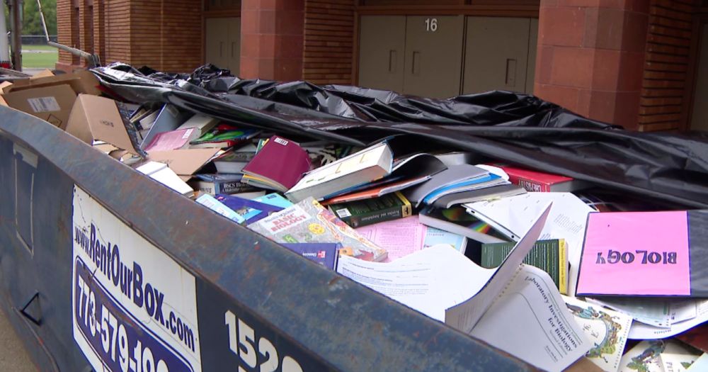 Dumpsters full of books seen outside high school on Chicago's Northwest Side