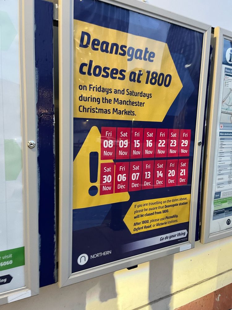A poster that states that Deansgate closes at 1800 on Fridays and Saturdays during the Christmas markets