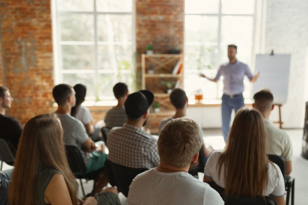 People sitting at a workshop