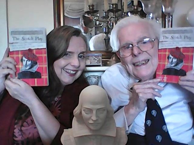 Ian, a man in his nineties, seated with daughter Lynn. They smile as they hold up copies of their book The Scotch Play - Ian's first to be published. 
A bust of Shakespeare is on the table between them.
