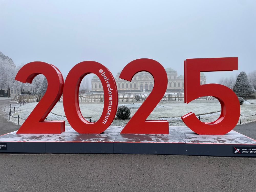 A 2025 sign in 3D standing in front of the Upper Belvedere Palace in Vienna, Austria 